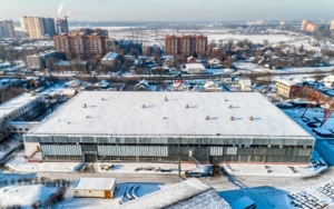 Overhead view of a commercial rooftop with snow covering it
