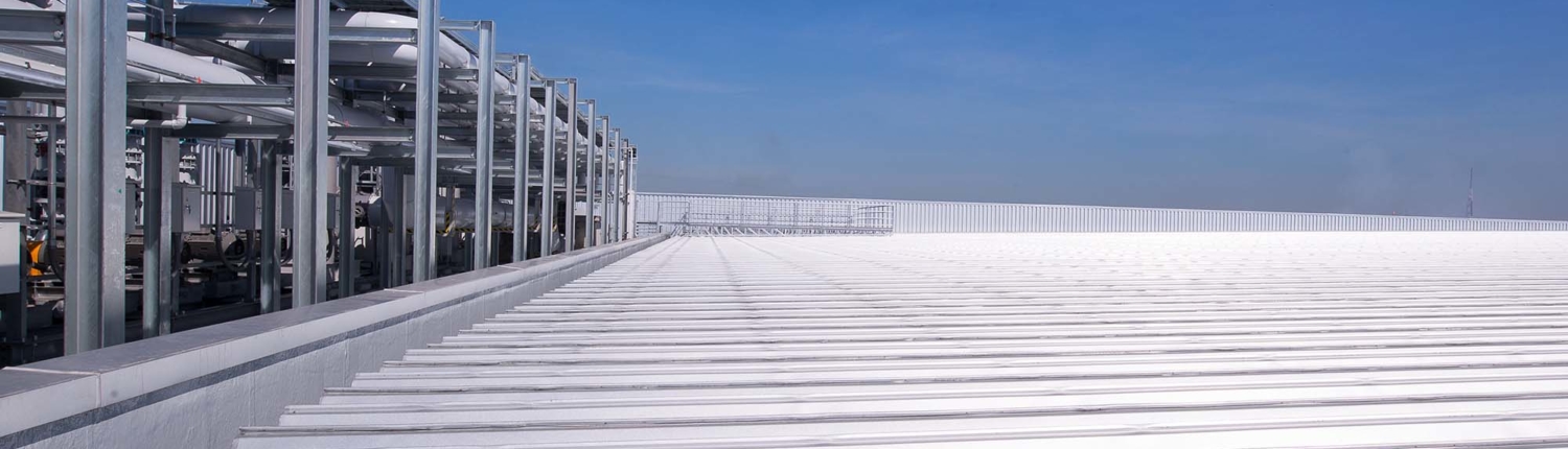 Flat commercial roof with mechanical equipment on top