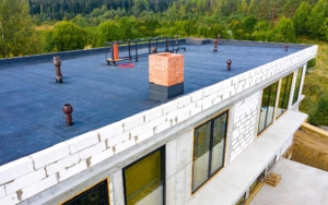 Waterproof layer on a flat commercial roof