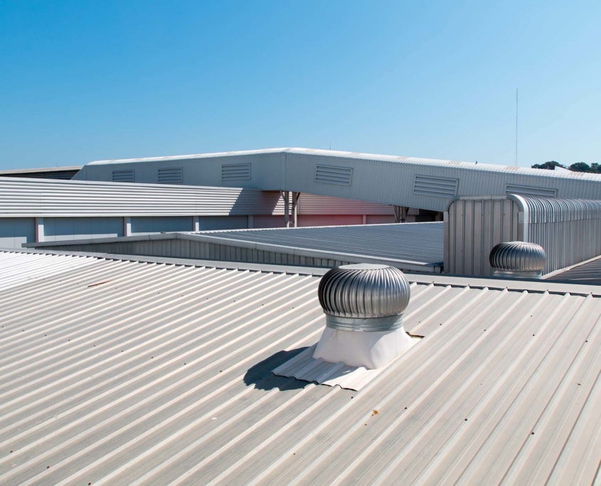 Roof ventilation turbines on a commercial metal roof
